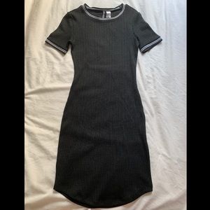 black, short sleeve form-fitting dress